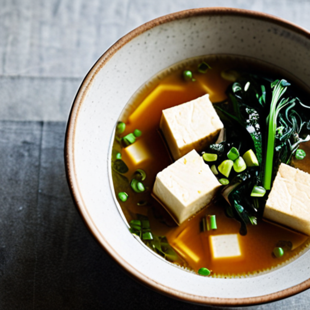 된장 - Miso Soup Still Life**
A bowl of steaming miso soup with tofu, wakame, and green onions. Shot from ...